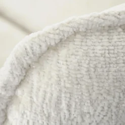 Poltrona design girevole imbottita in tessuto panna nero Montana