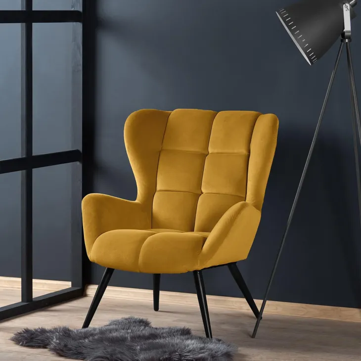 Poltrona imbottita in velluto giallo senape nero Polly