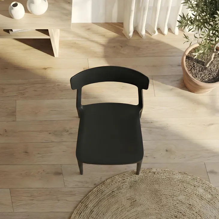Sedia da pranzo impilabile moderna in polipropilene nero Hans